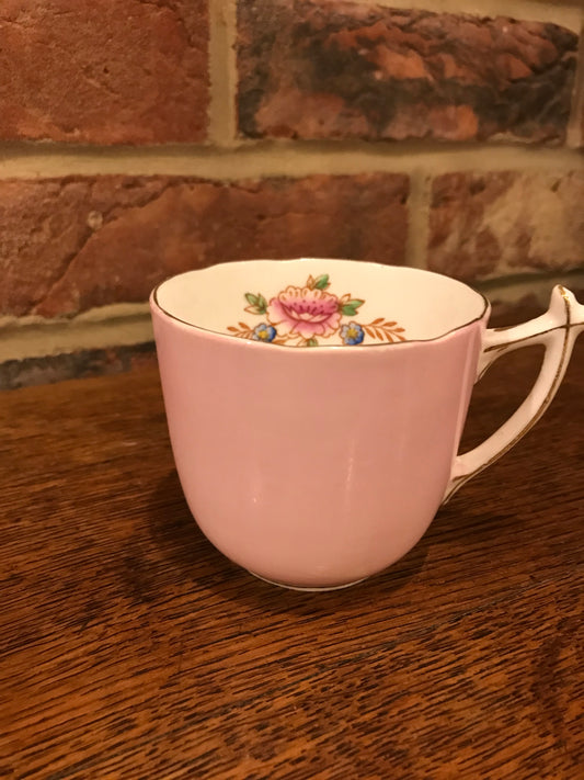 Pink cup and saucer